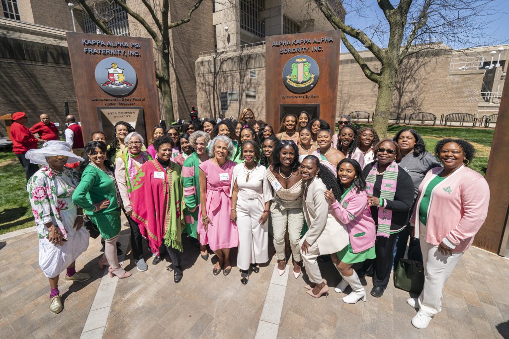 Members of Alpha Kappa Alpha Sorority infant of their Sign