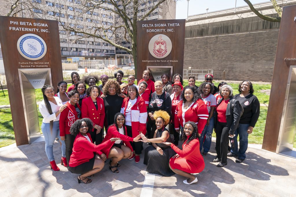 Members of Delta Sigma Theta Sorority in front of their sign